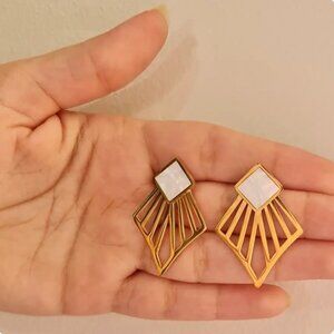 A set of 4 stainless earrings